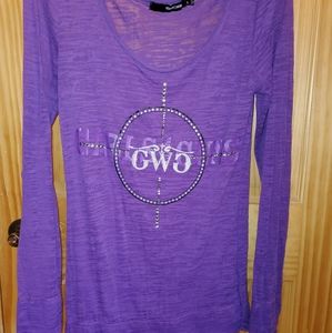 Purple long sleeve and shear material.